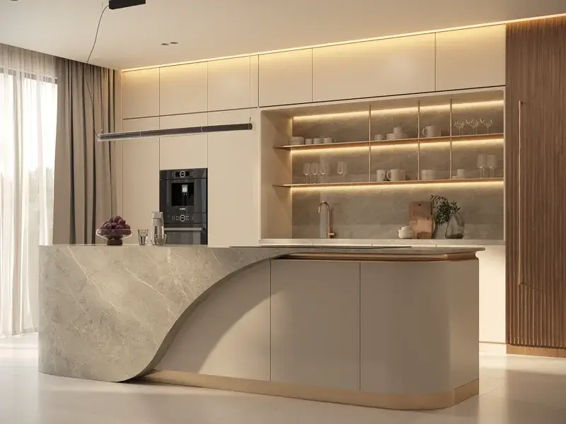 Curved stone island with brass detailing and timber cabinetry