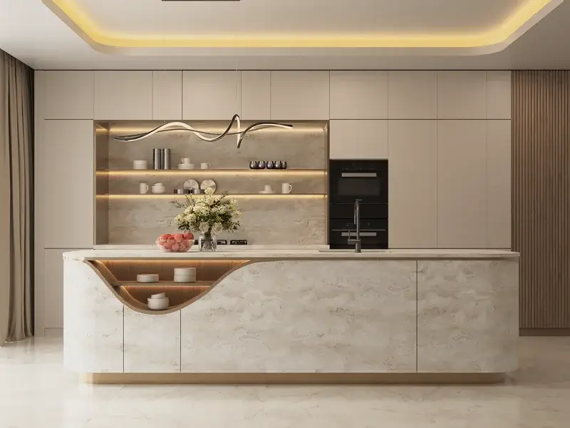 Front view of sculpted kitchen island and full height cabinetry