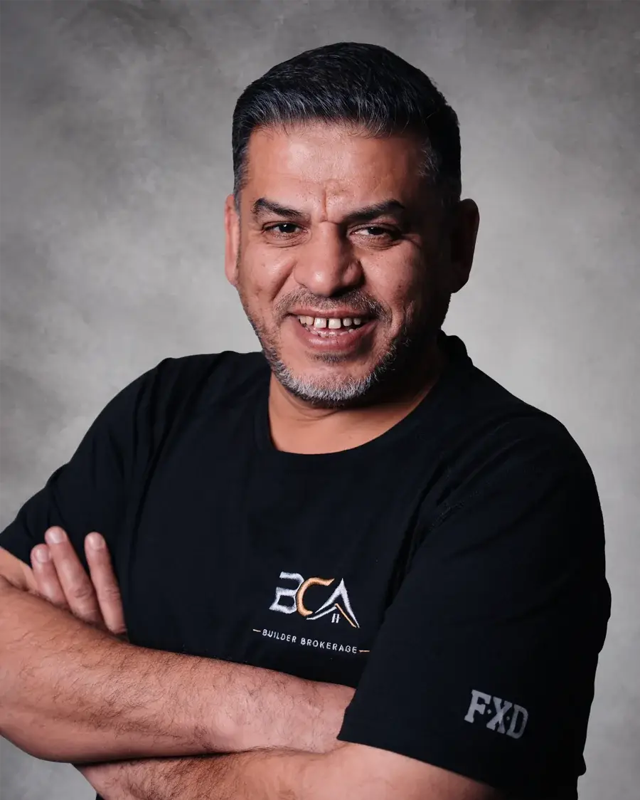 BCA team member with dark hair in a black BCA shirt